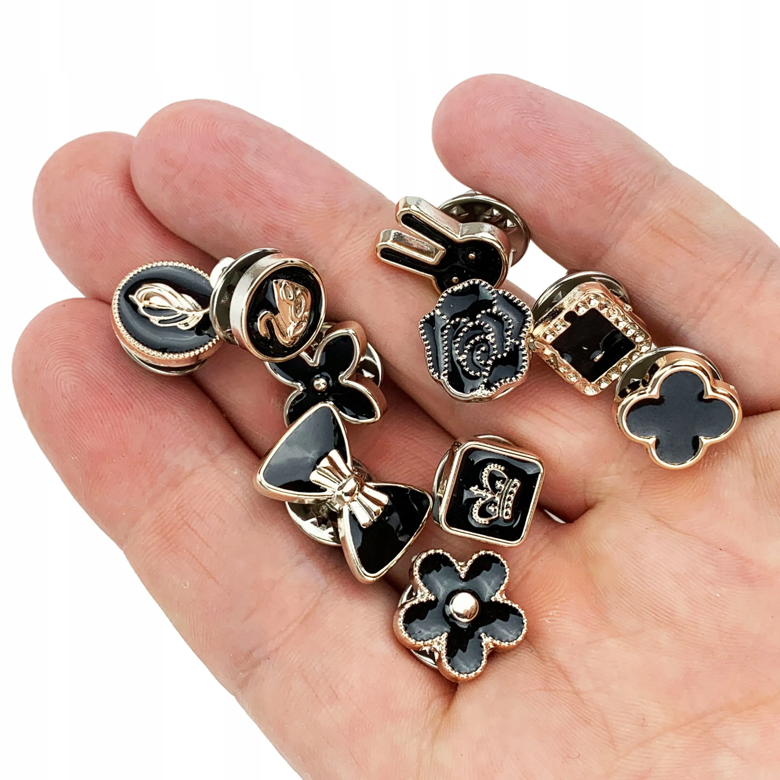 Set of 10 pins with womanly motifs